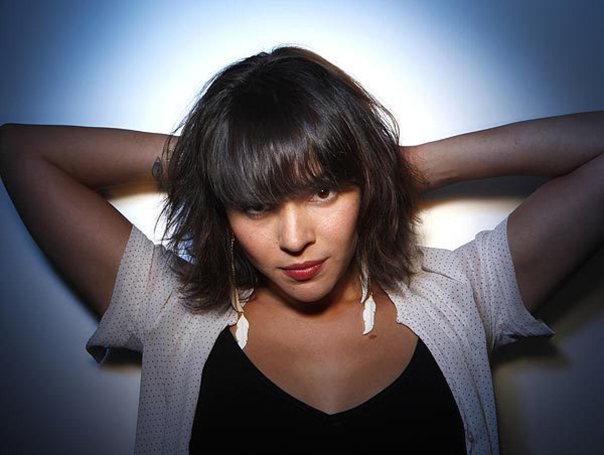 Singer-songwriter Norah Jones, whom Charles Finch found himself listening to in spite of himself.