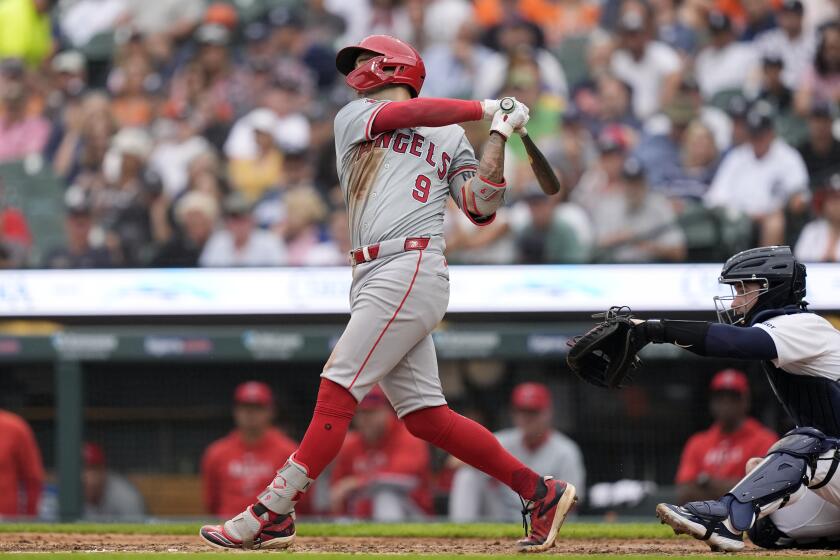 Los Angeles Angels' Zach Neto connects for a two-run home run during the fifth inning of a baseball game against the Detroit Tigers, Thursday, Aug. 29, 2024, in Detroit. (AP Photo/Carlos Osorio)