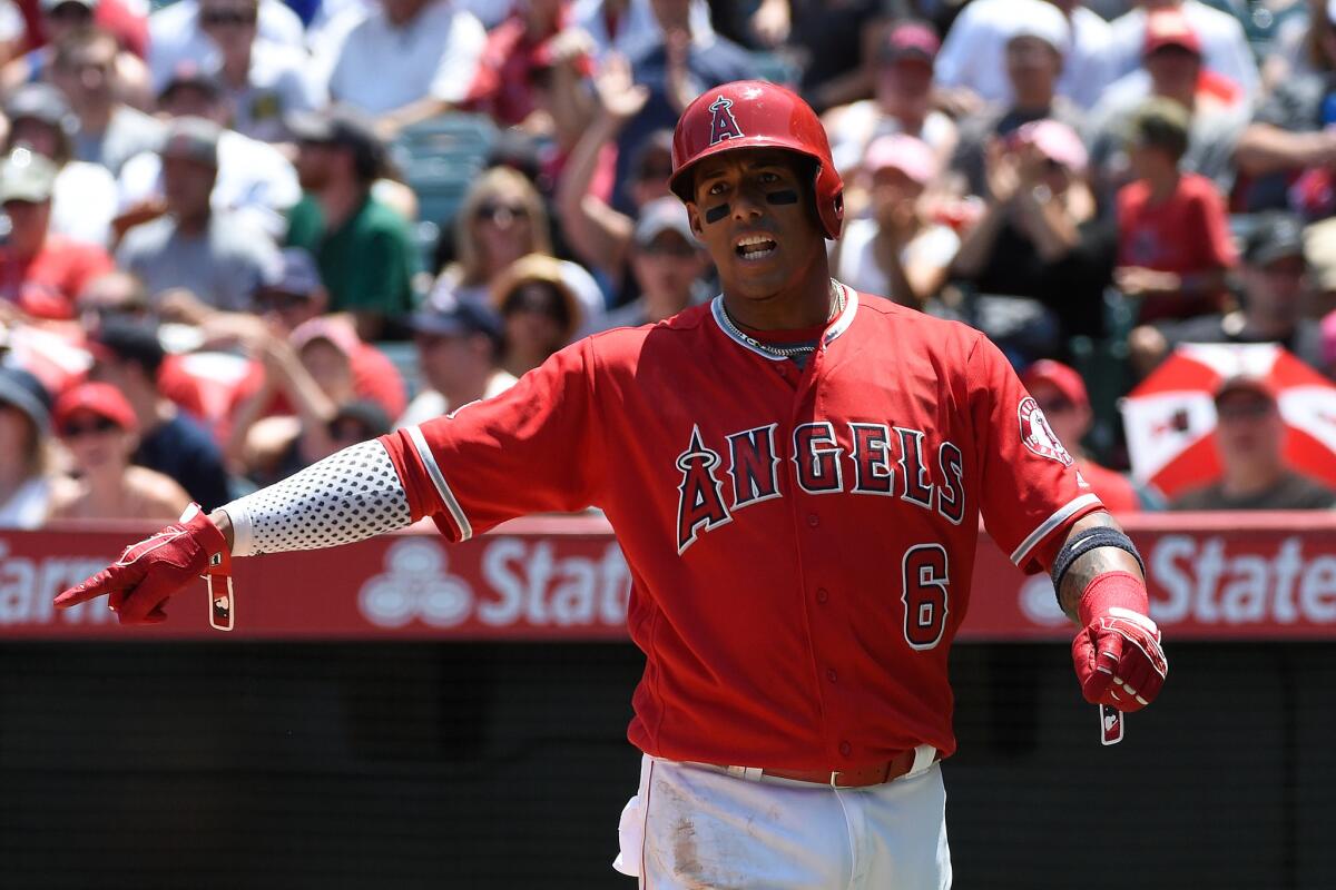 Angels third baseman Yunel Escobar reacts after being called out at home plate in the first inning against the Red Sox on July 31.