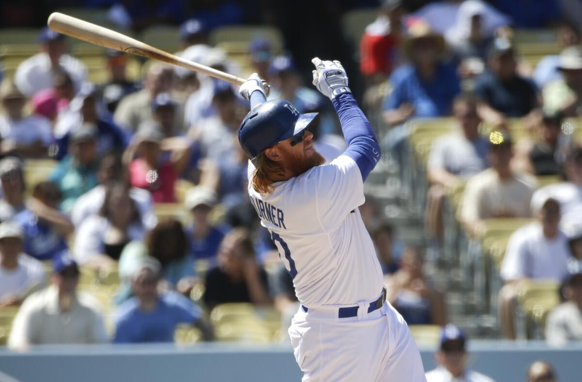 Justin Turner hits a two-run home run in the seventh inning off of Washington's Jordan Zimmermann. Turner claimed to have been hit by an earlier pitch, but after an official review, the call on the field was upheld.