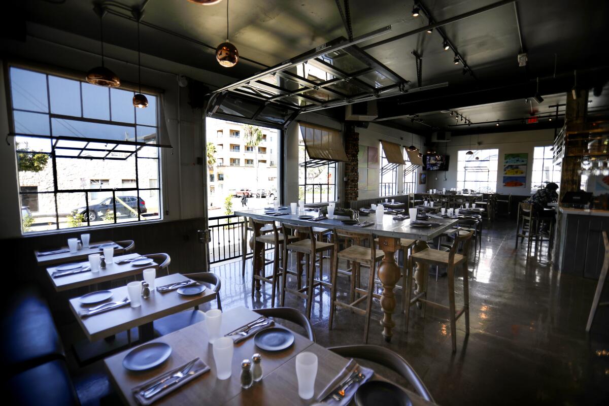The main dining room of the original Blade-Tribune and News building on Seagate Drive in Oceanside, built in 1936, and designed by famed architect Irving Gill, is now home to the the new Italian restaurant Blade 1936, which has a newspaper-theme that celebrates newspapers, and especially the ones that once called the building home. Photographed September 24, 2019, in Oceanside, California.