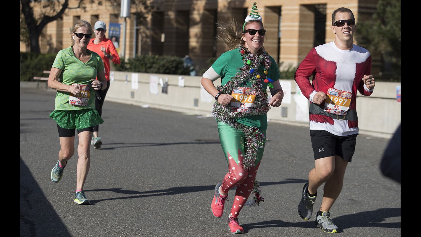 Photo Gallery the 4th Annual “Run for a Claus” 5k and 1mile kids run