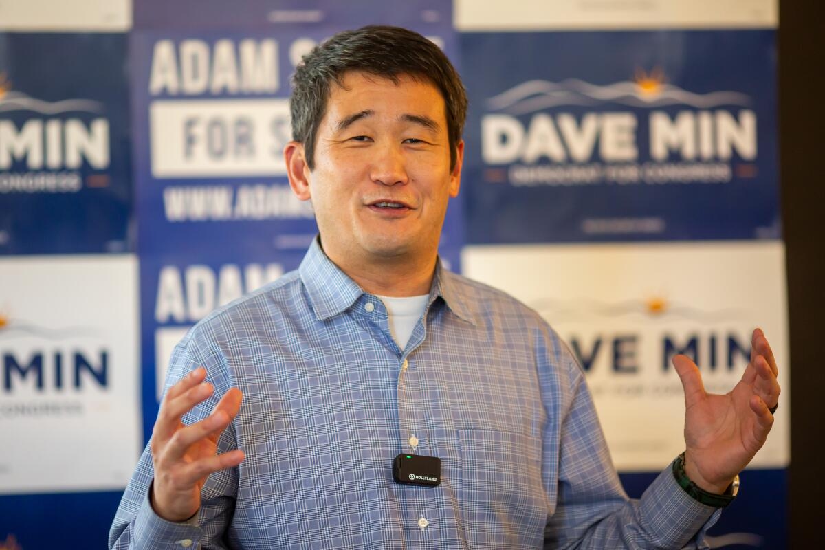 Congressional Candidate Dave Min speaks during a campaign event.