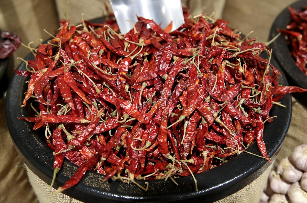 Fresh chiles in baskets at the Northgate marketplace, Mercado González on opening day.