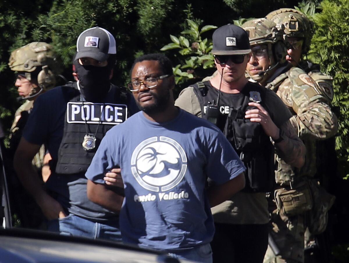 Ayoola Ajayi, 31, was arrested in Salt Lake City on Friday on suspicion of killing University of Utah student Mackenzie Lueck, 23, of El Segundo.