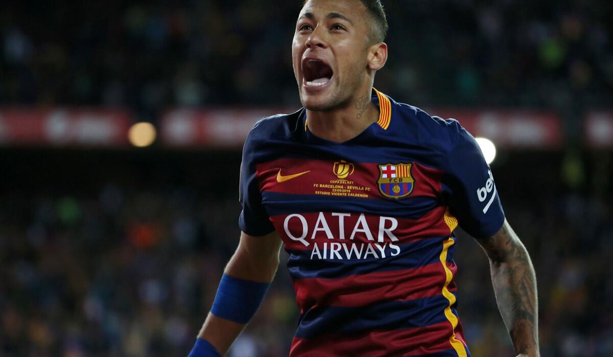 Neymar celebrates at the end of the Copa del Rey final match on May 22.