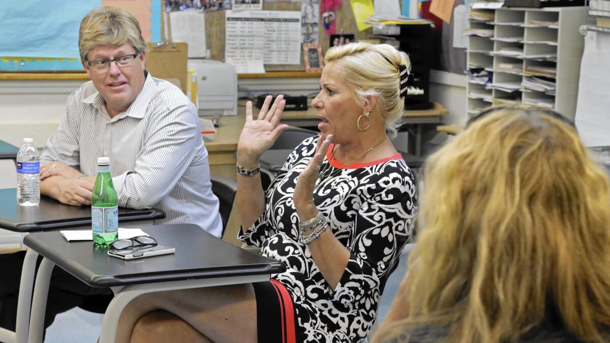 Parents David and Michelle Hollister weigh in during a discussion.