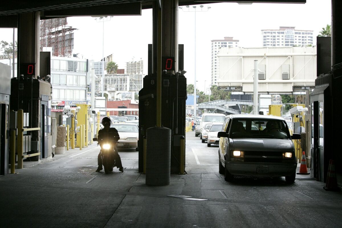 The number of people crossing the border at the San Ysidro Port of Entry -- seen here in 2009 -- has dipped sharply in during the past decade, due to a combination of factors that include tighter security measures.