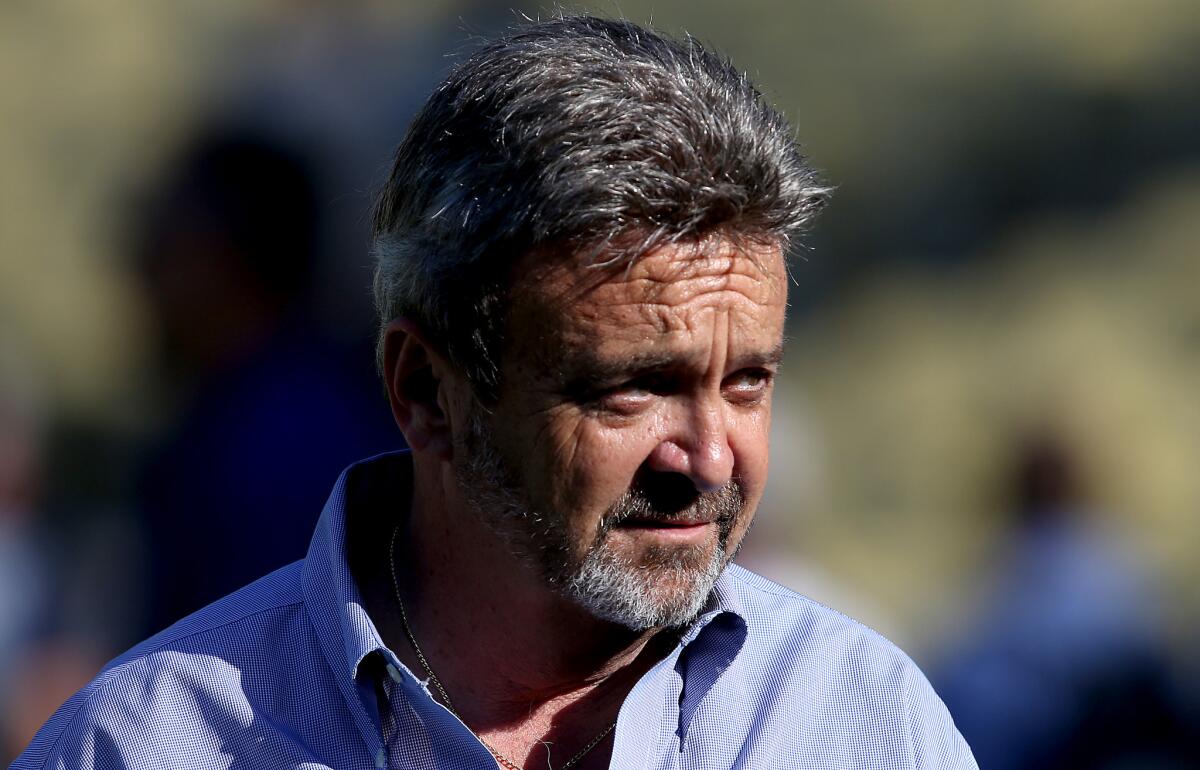 General Manager Ned Colletti is said to be on the hot seat after the Dodgers' exit from the playoffs.