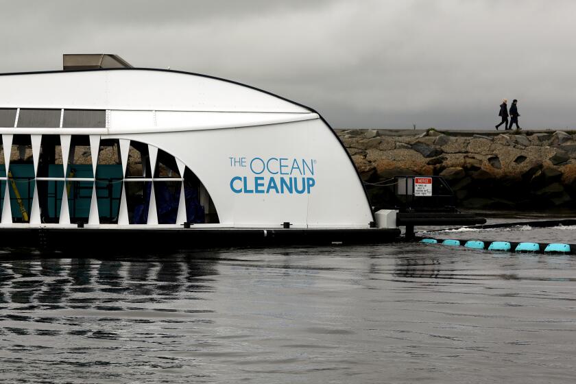 LOS ANGELES-CA-JANUARY 4, 2023: An interceptor, made by the Dutch nonprofit The Ocean Cleanup, serves as a last line of defense against trash flowing into the Pacific Ocean by way of Ballona Creek on Wednesday, January 4, 2023. (Christina House / Los Angeles Times)