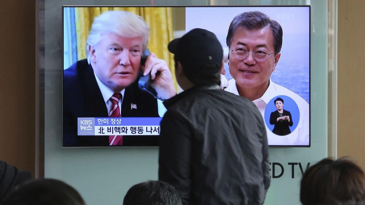 President Trump and South Korean President Moon Jae-in on a South Korean news broadcast seen on a TV monitor at the Seoul Railway Station on March 17, 2018.