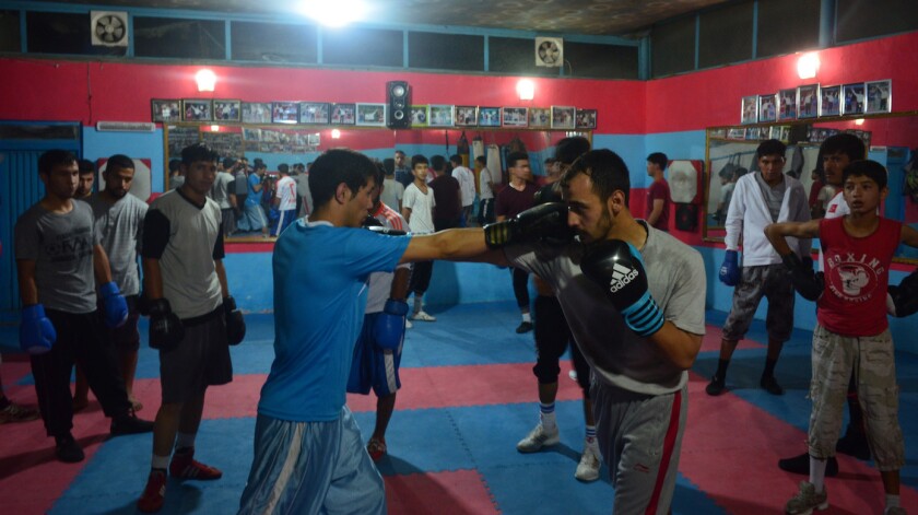 Boxers spar at a small gym in Kabul, Afghanistan.