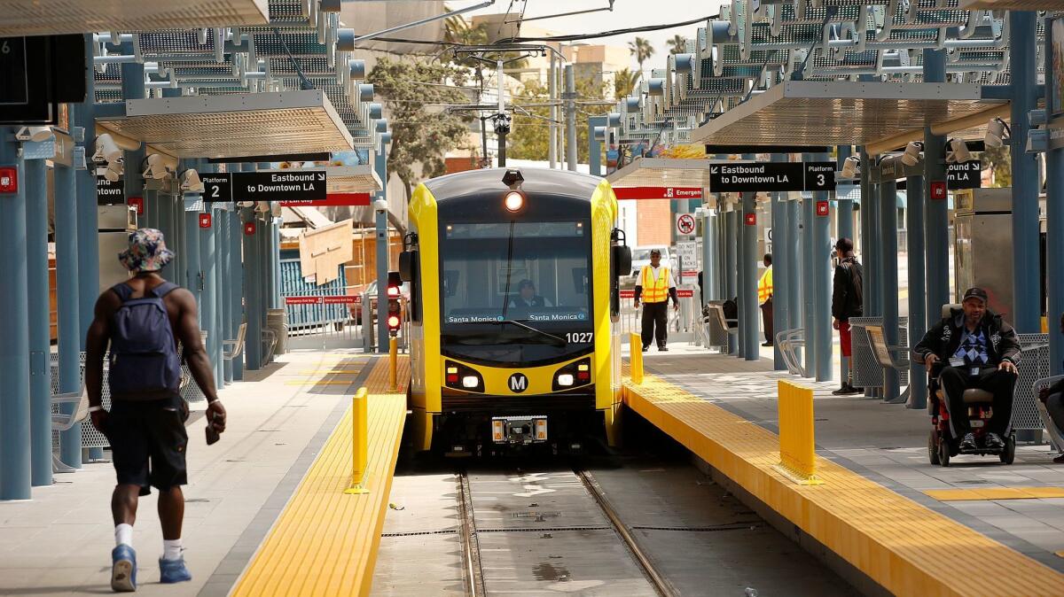 Los Angeles County voters on Tuesday approved a tax to expand its mass-transit network. Pictured here: The new Expo Line pulling into Santa Monica.