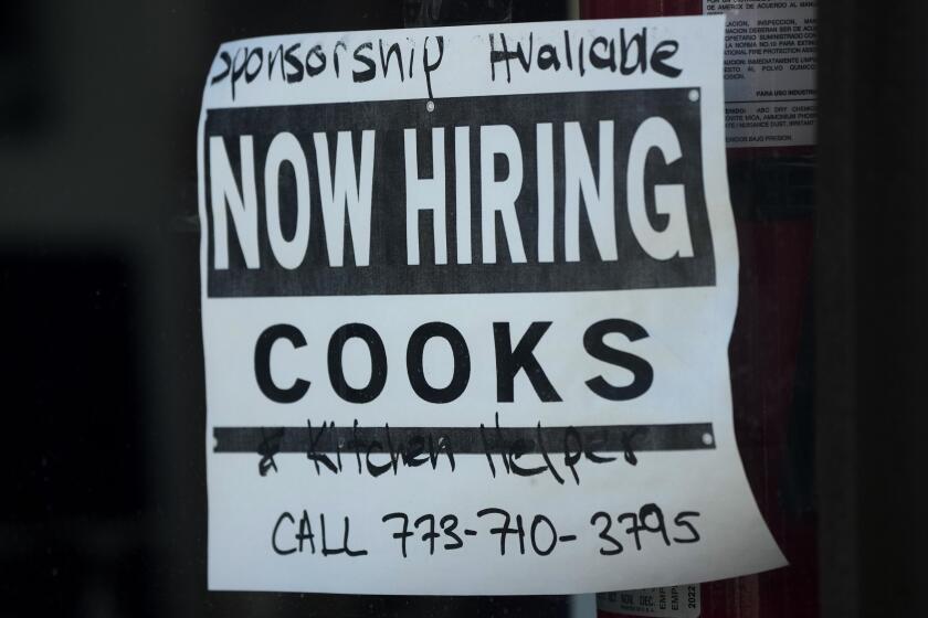 A hiring sign is displayed at a restaurant in Chicago, Monday, March 11, 2024. On Thursday, April 25, 2024, the Labor Department reports on the number of people who applied for unemployment benefits last week. (AP Photo/Nam Y. Huh)