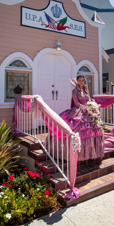 2021 Festa Queen Jaquelyn Neves stands on the steps of the UPSES (United Portuguese Society of the Holy Spirit) chapel on Avenida de Portugal in Point Loma.