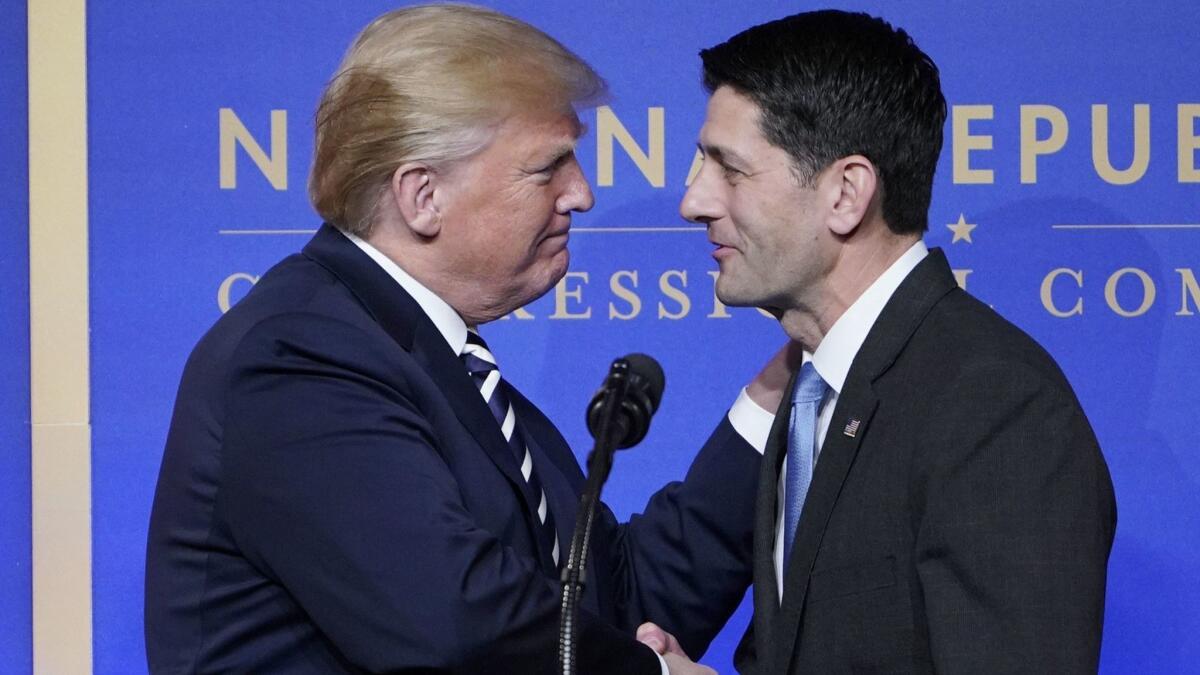 House Speaker Paul D. Ryan greets President Trump at the National Republican Congressional Committee Dinner in Washington on March 20.