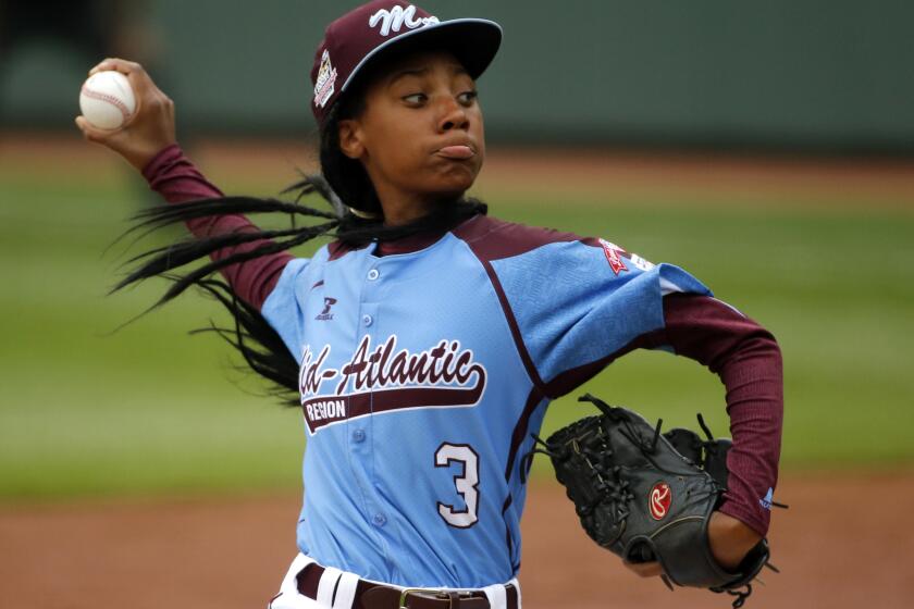 In this Aug. 15, 2014, photo, Philadelphia's Mo'ne Davis pitches against Nashville at the Little League World Series.