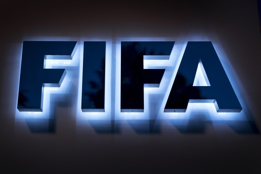 The FIFA logo at the entrance to the world soccer governing body's headquarters in Zurich.