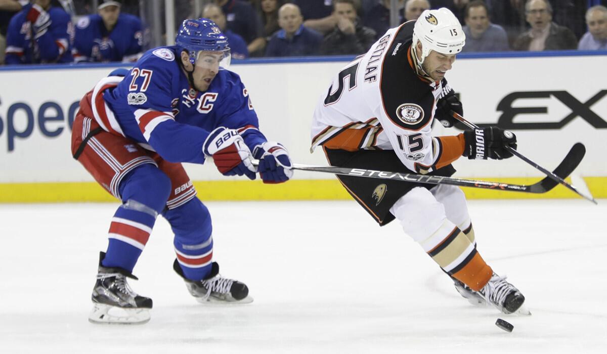 The Ducks' Ryan Getzlaf (15) skates past the New York Rangers' Ryan McDonagh (27) during the first period Tuesday.