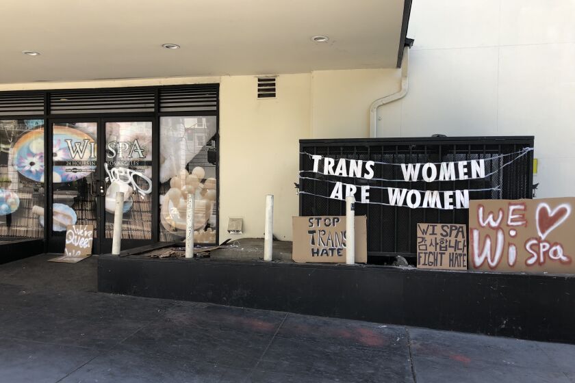 A sign outside of Wi Spa in Koreatown says: "Trans women are women."