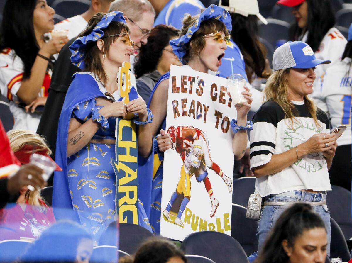 Chargers fans cheer during the first half against the Kansas City Chiefs.