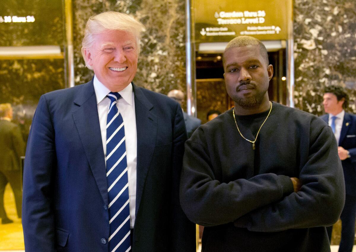 Donald Trump and rapper Kanye West at Trump Tower in New York on Dec. 13, 2016.