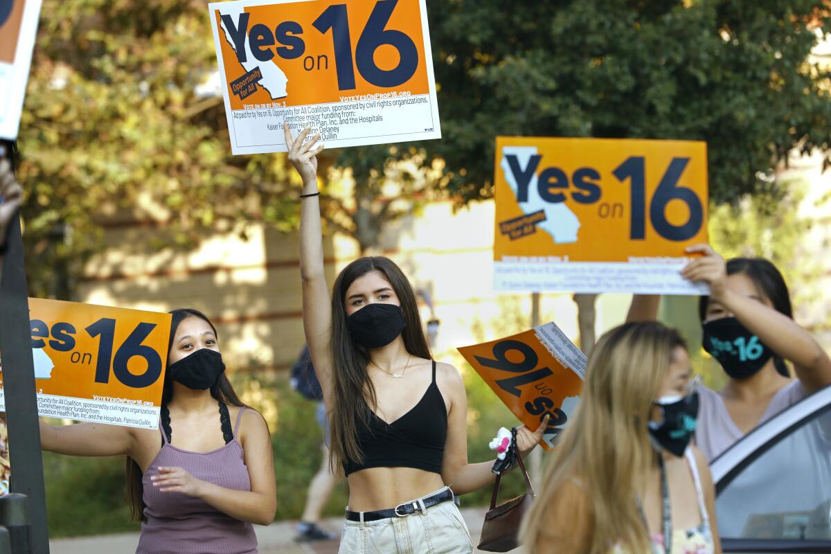 Students rally at UCLA in support of Proposition 16 on Oct. 16. 