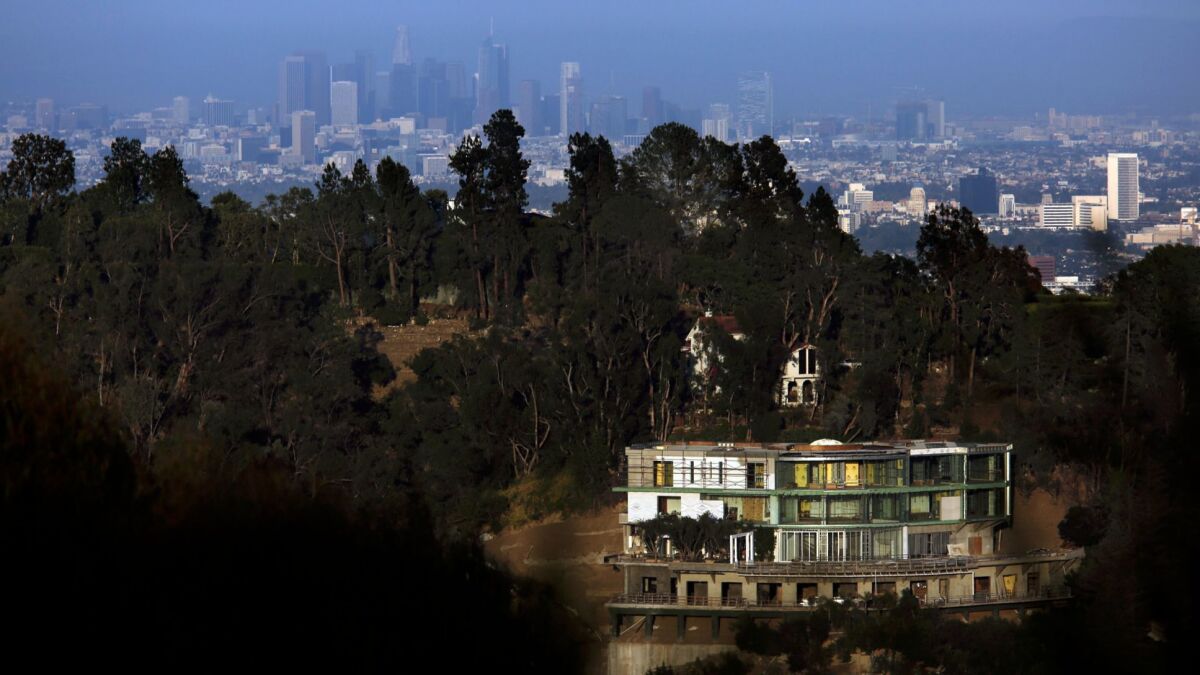 The unfinished mansion sits on Strada Vecchia Road in Bel-Air.
