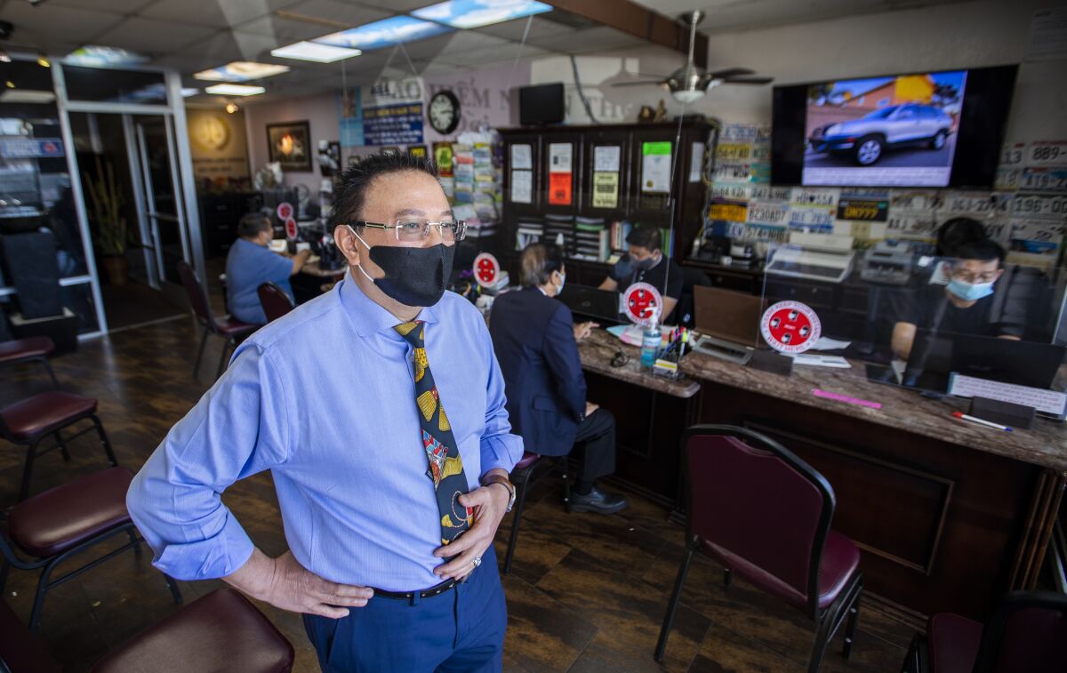 Michael Vo, mayor pro tem of Fountain Valley, requires employees and customers to wear face coverings.