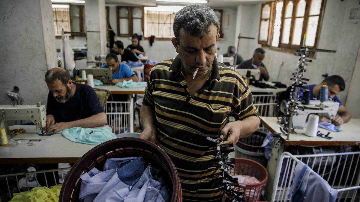 Fayez Shubair, manages garment workers at the Nafez Shubair factory.