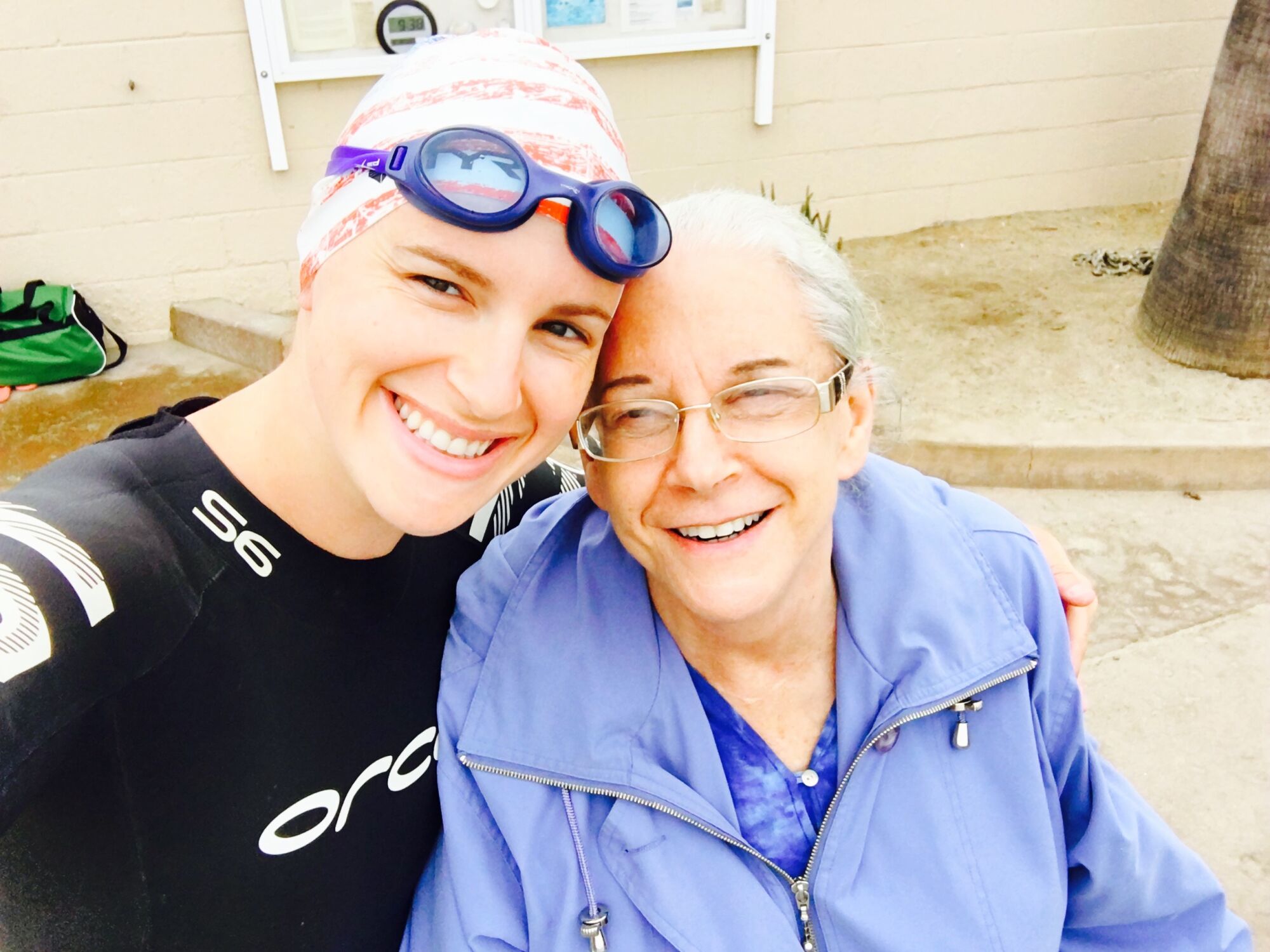 Susan Bos takes a selfie after racing in a triathlon next to her mom, Florence "Flossie" Bos.