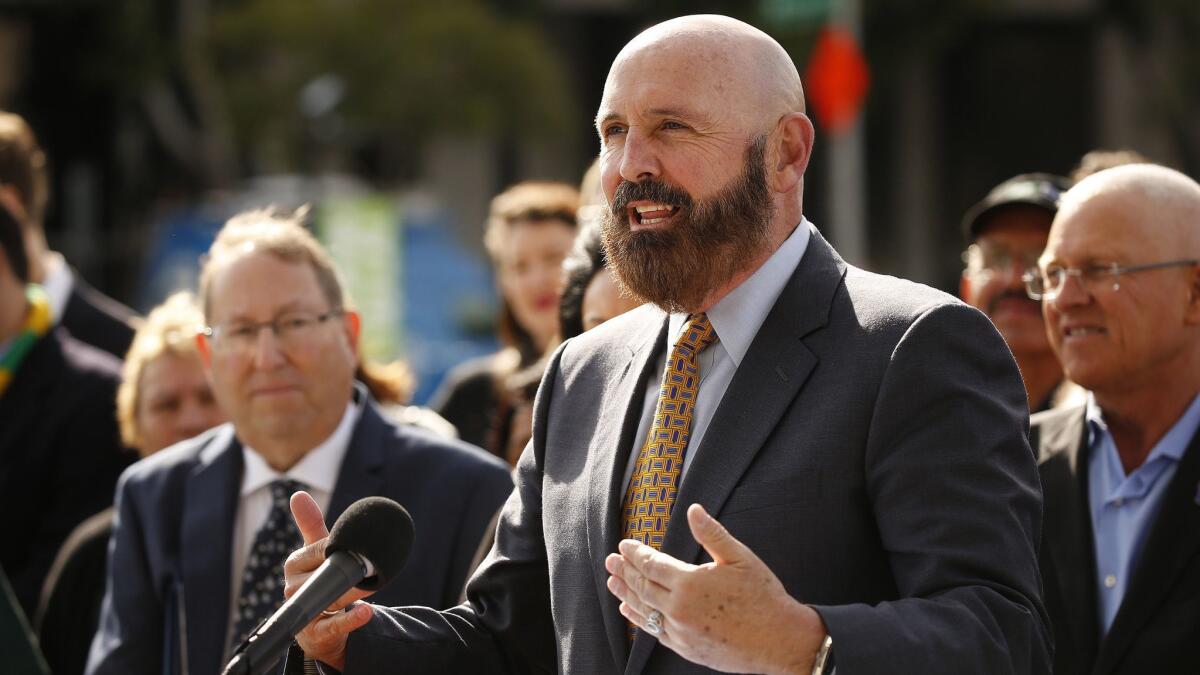 DWP General Manager David Wright, the nation's largest municipally owned utility, during a news conference outside the utility's headquarters Tuesday, Feb. 12.