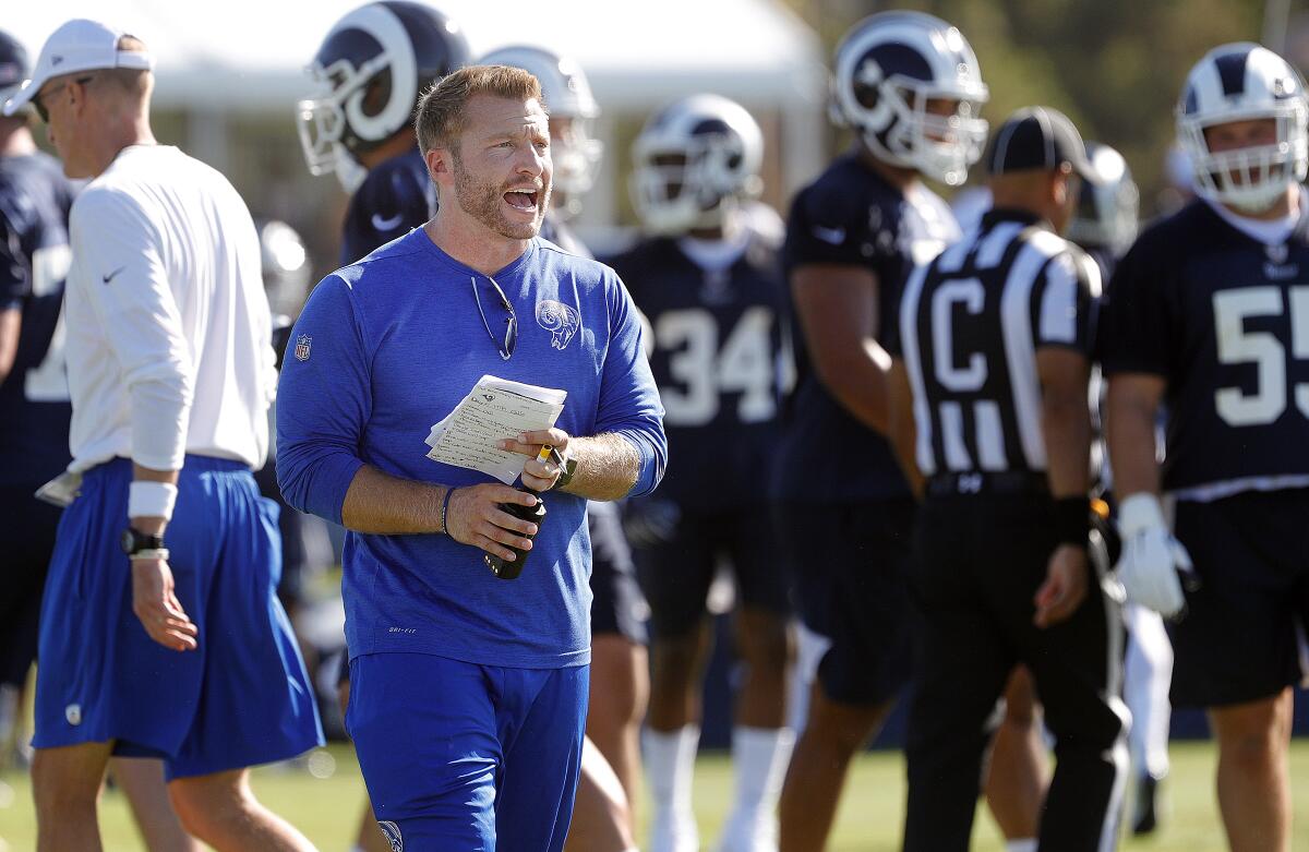Rams coach Sean McVay instructs players during a team training camp session Aug. 5.