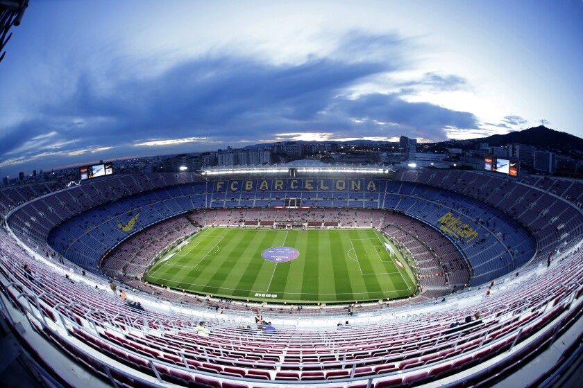 FILE - A general view of the Camp Nou stadium prior of a Spanish Copa del Rey soccer match between Barcelona and Leganes, in Barcelona, Spain, Thursday, Jan. 30, 2020. Barcelona has auctioned off a digital art piece depicting an iconic goal by Johan Cruyff for $693,000 as it seeks new revenues to battle its way out of massive debt. Barcelona says that the auction run by Sotheby’s in New York for the club’s first NFT, or non-fungible token, closed at $550,000. The auctioneer’s fees increased the final sale price to $693,000. (AP Photo/Joan Monfort, File)