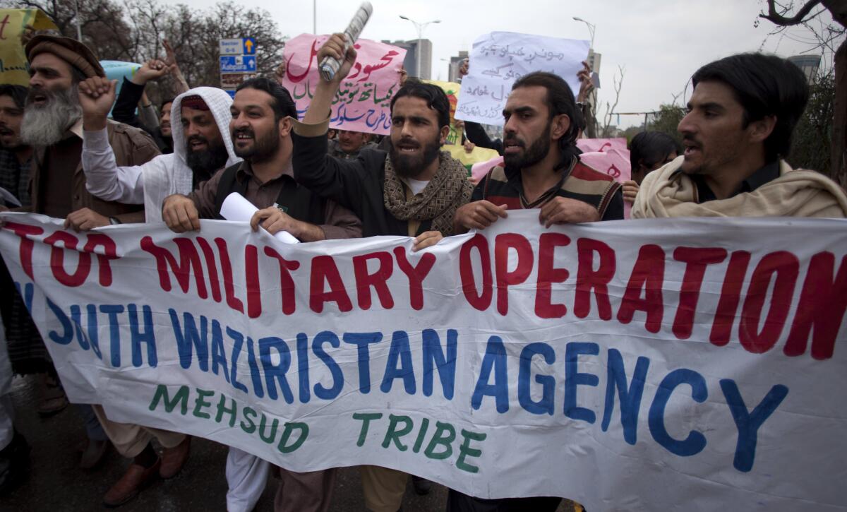 Pakistani tribal people from South Waziristan hold a rally in Islamabad to condemn U.S. drone attacks and military operations against Taliban and Al Qaeda militants.