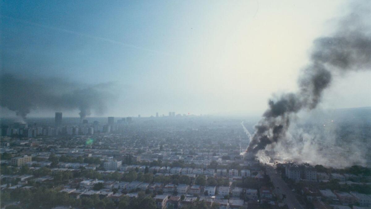 Midtown showing plumes of smoke from the numerous building fires in the city on April 30, 1992. (Ken Lubas / Los Angeles Times)