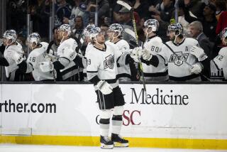 Los Angeles Kings right wing Adrian Kempe (9) is congratulated for his goal against the San Jose Sharks.