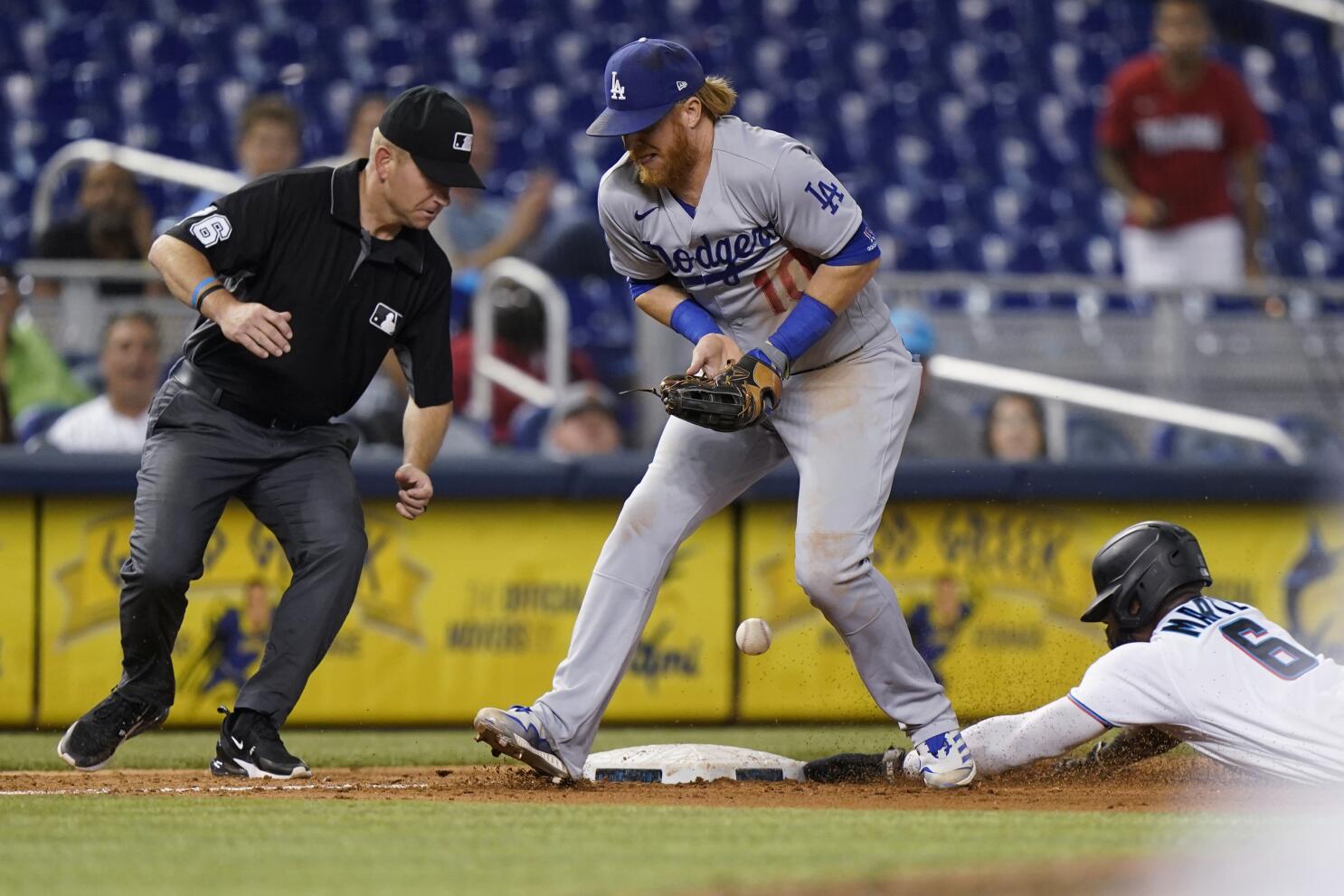 Marlins end Dodgers' win streak in style with 5 homers