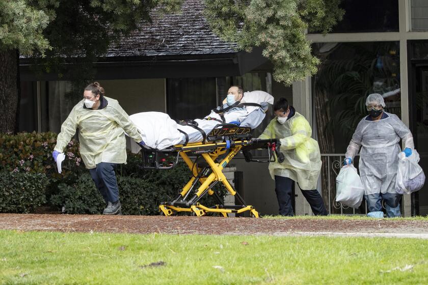Patients are moved from the Magnolia Rehabilitation and Nursing Center in Riverside after staff failed to show up on April 7, 2020.