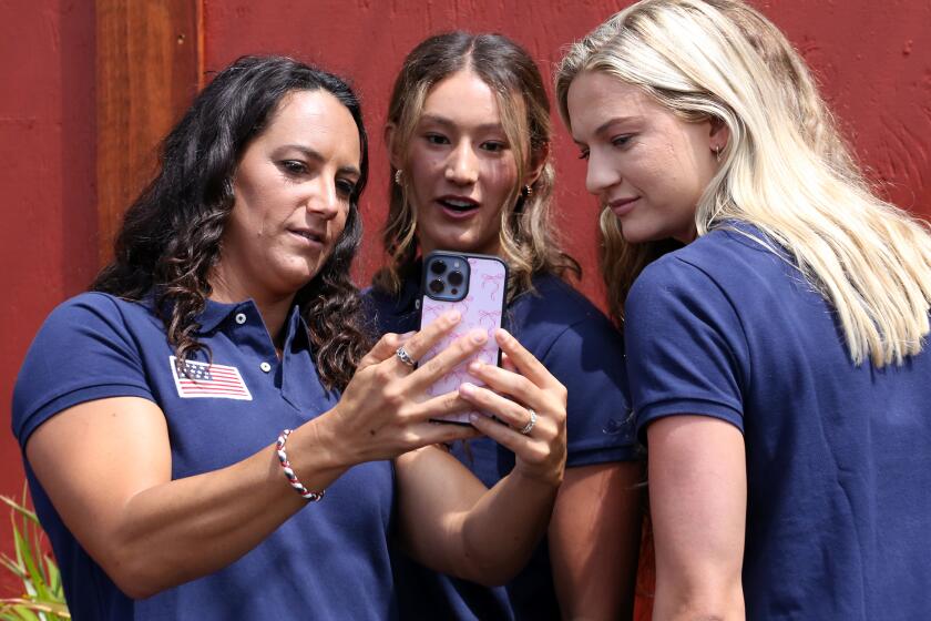 The U.S. 2024 Olympic women's water polo team captain Maggie Steffens takes selfies with her teammates during a press conference announcing the U.S. 2024 Olympic women's water polo roster at Republique Cafe Bakery & Republique Restaurant in Los Angeles on Thursday, May 30, 2024. (Photo by James Carbone)