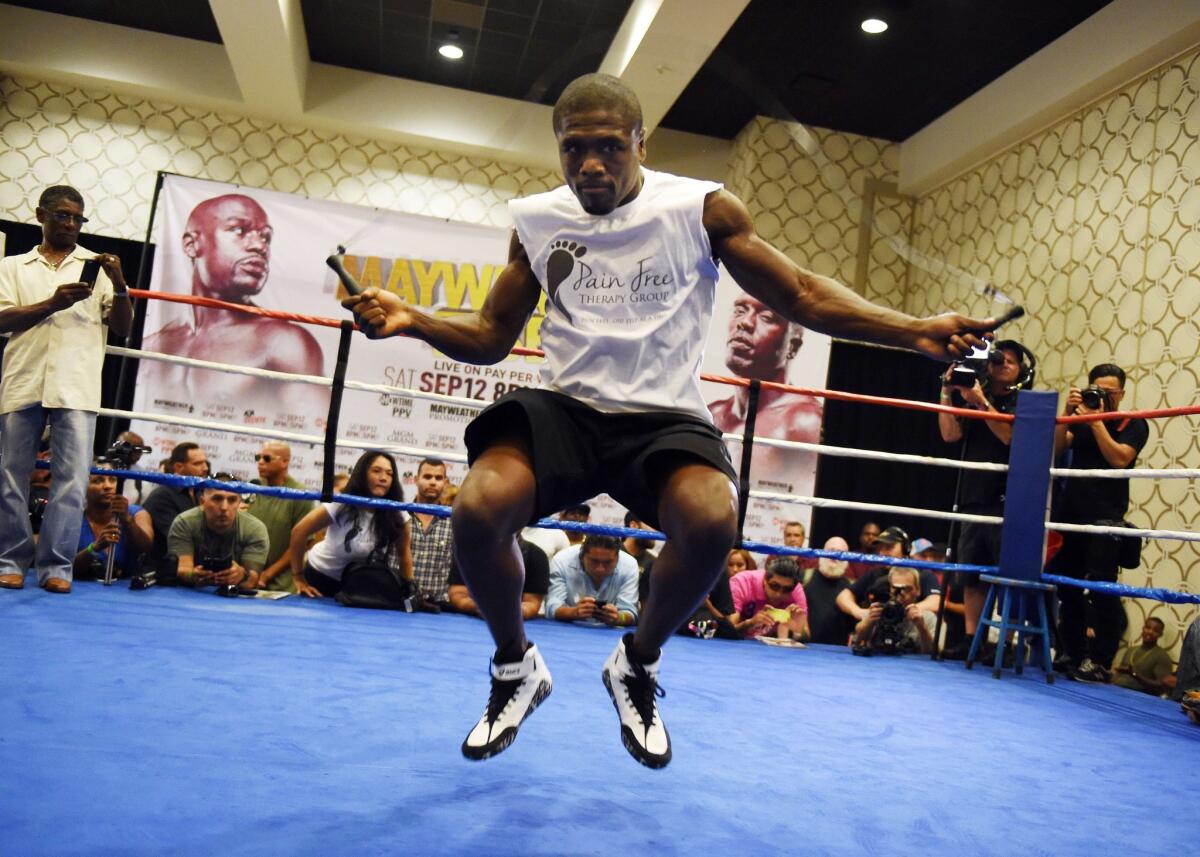 Boxer Andre Berto uses a jump rope during a workout at the Marriott Hotel in Los Angeles, California on August 28, 2015, before his September 12 fight against Floyd "Money" Mayweather that will take place at the MGM Grand Garden Arena in Las Vegas. Mayweather claims it will be the last ever opportunity to see him fight. AFP PHOTO/ MARK RALSTONMARK RALSTON/AFP/Getty Images ** OUTS - ELSENT, FPG - OUTS * NM, PH, VA if sourced by CT, LA or MoD **