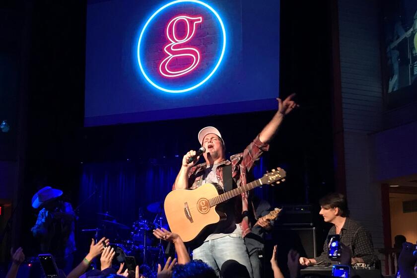 Garth Brooks performed Thursday at Buck Owens Crystal Palace in Bakersfield as part of his Dive Bar Tour of small venues in the midst of his summer stadium tour. Part of the mission of the Dive Bar Tour is to promote responsible alcohol consumption among country music audiences. Brooks played to about 600 fans, who won tickets through radio station contests, on the same stage where he proposed to his wife, singer Trisha Yearwood, in 2005. Credit: Randy Lewis/Los Angeles Times