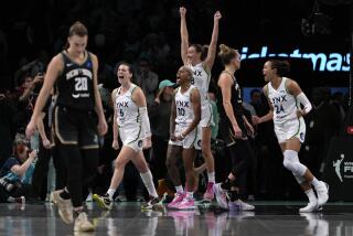 Minnesota's Bridget Carleton, Courtney Williams, Alanna Smith and Napheesa Collier celebrate after beating the Liberty 