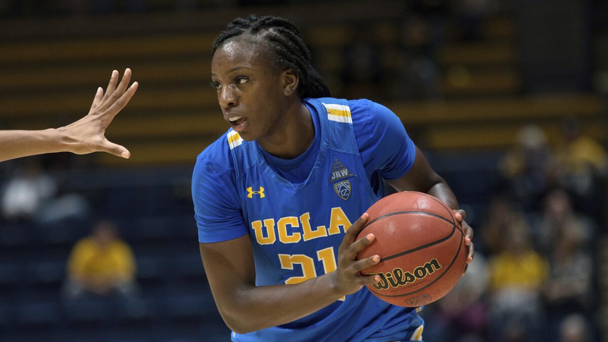 UCLA's Michaela Onyenwere looks to pass during a game against California on Jan. 4.