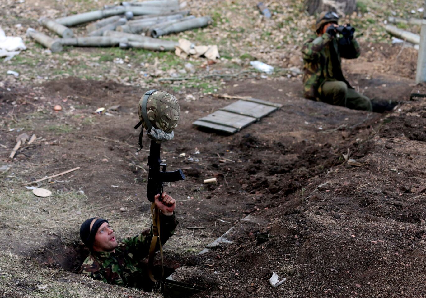 Fighters from the pro-government Right Sector militia provoke an enemy sniper.