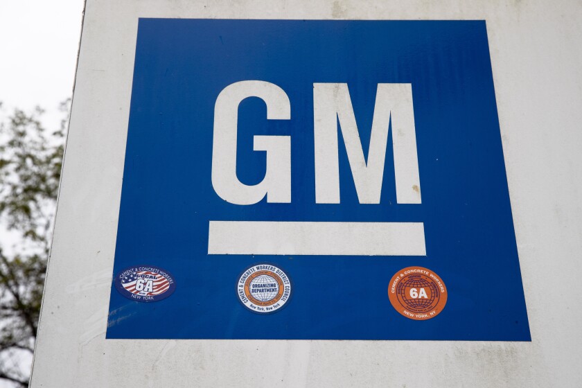 FILE - This Oct. 16, 2019, file photo shows a sign at a General Motors facility in Langhorne, Pa. General Motors says, Wednesday, Jan. 26, 2022, it wants to fill more than 8,000 technical job openings this year. The Detroit automaker is looking for software, computer, mechanical and electrical engineers, as well as battery engineers, cybersecurity experts and others. (AP Photo/Matt Rourke, File)