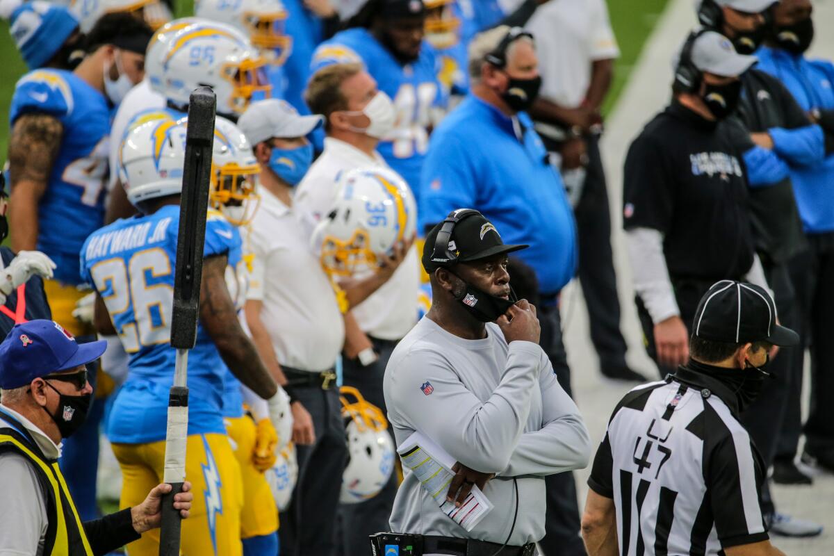 Chargers coach Anthony Lynn watches his team from the sideline 