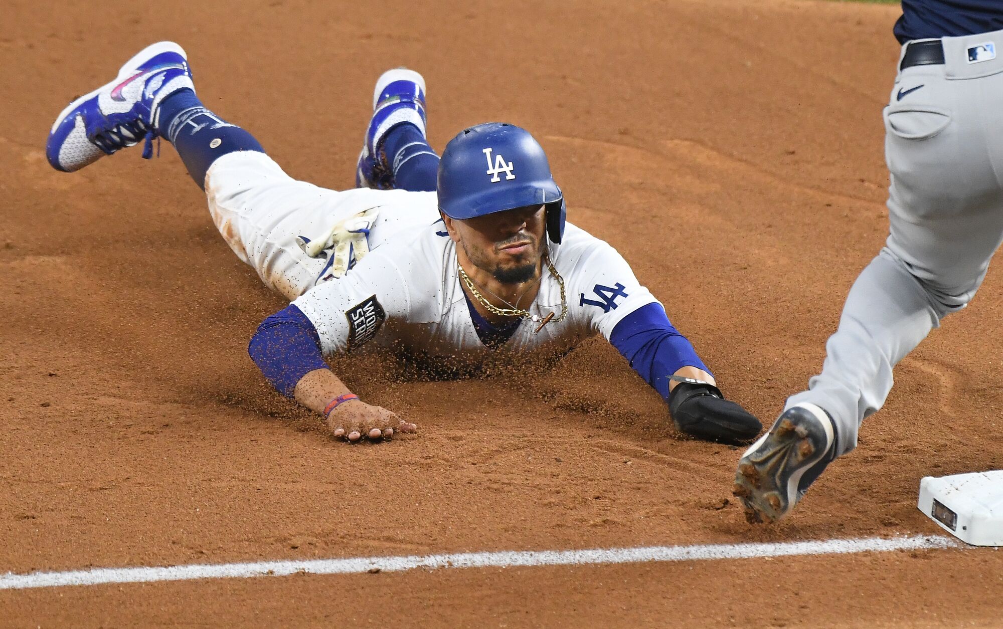Dodgers Mookie Betts steals 3rd base against the Rays in the 5th inning in Game 1 of the World Series 