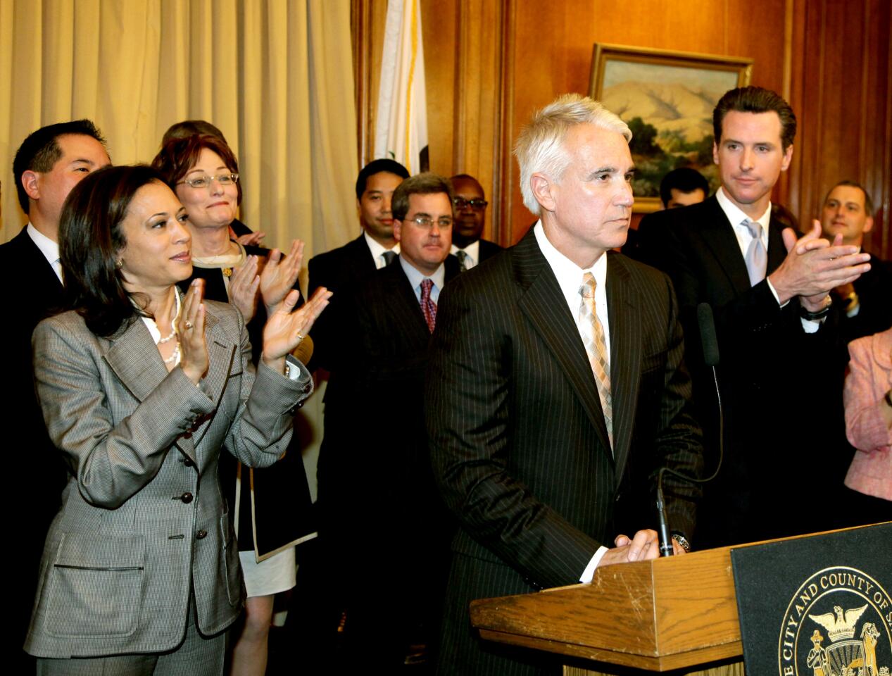 June 17, 2009: San Francisco Dist. Atty. Kamala Harris applauds as George Gascon is introduced by Mayor Gavin Newsom.