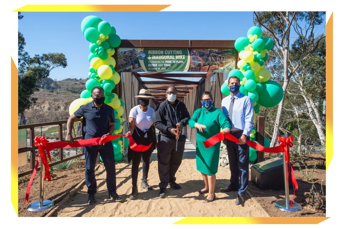 Ribbon-cutting to mark the opening of the last stretch of the Park to Playa Trail.